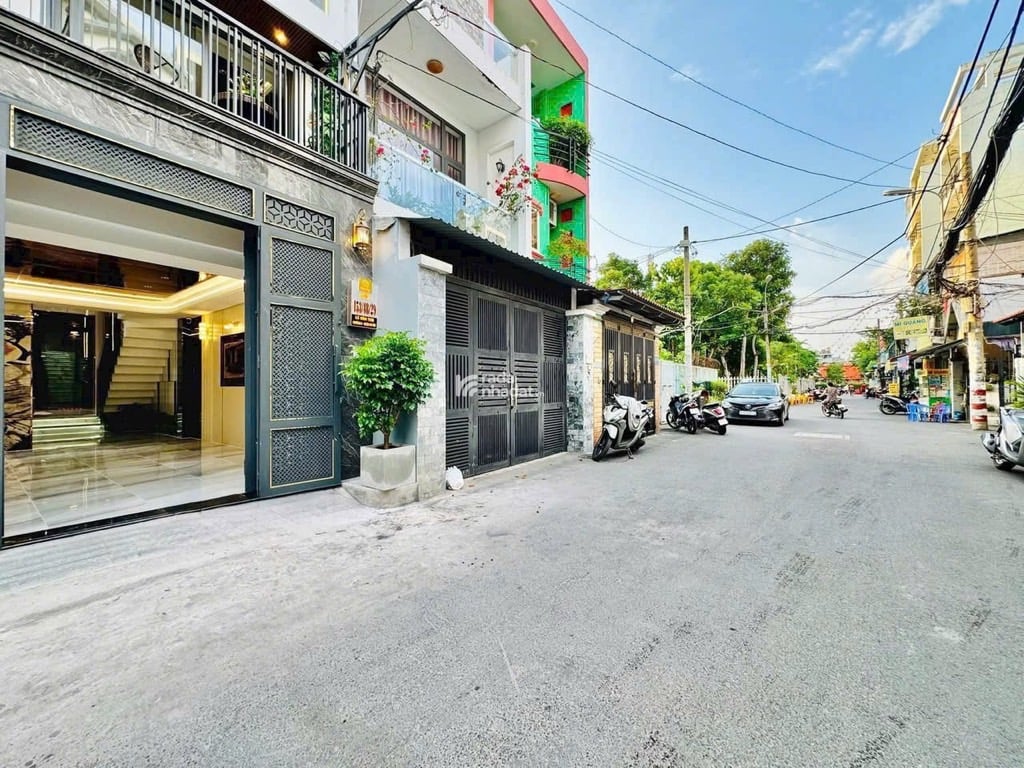 5 TẦNG THANG MÁY FULL NỘI THẤT CÔNG VIÊN LÀNG HOA LÊ VĂN THỌ GÒ VẤP- DT: 4*15M- 14 TỶ 9