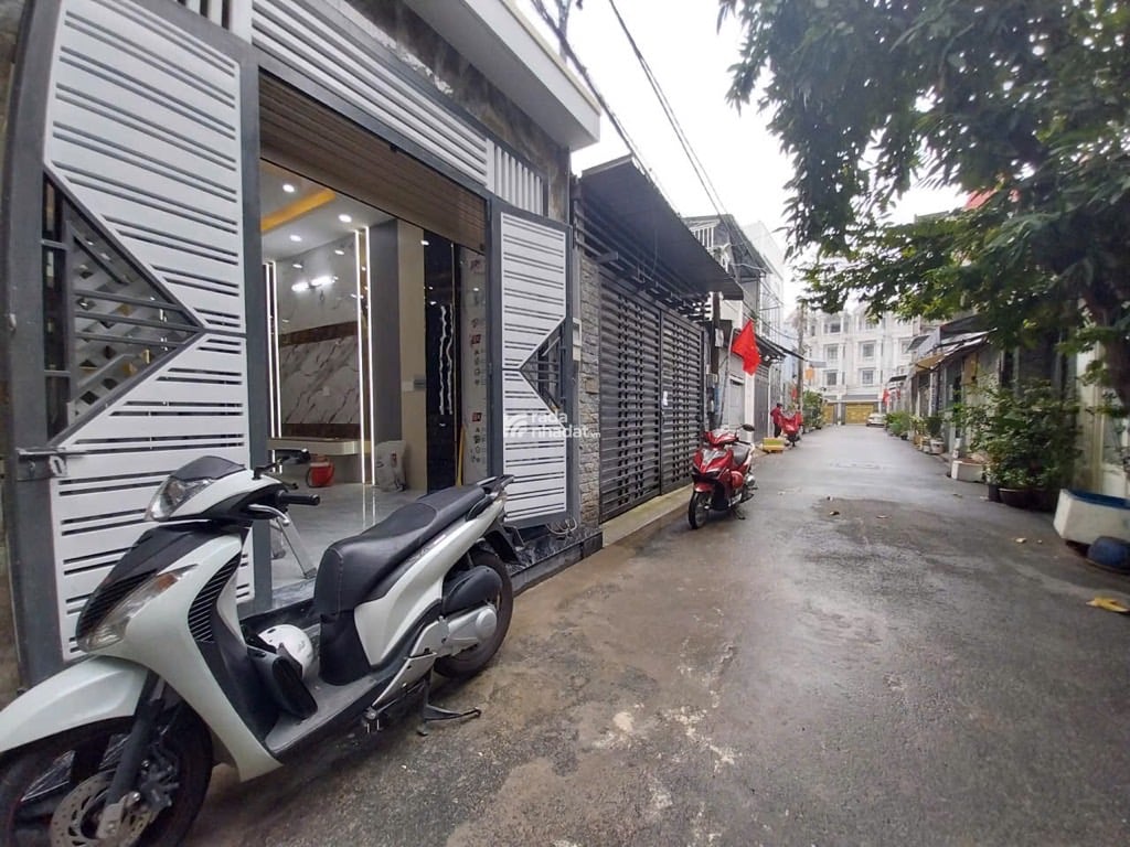 BÁN NHÀ LÊ VĂN KHƯƠNG HIỆP THÀNH QUẬN 12 - DIỆN TÍCH 61.3m - 1 TRỆT 3 LẦU CÓ THANG MÁY - HXH - 7.5T