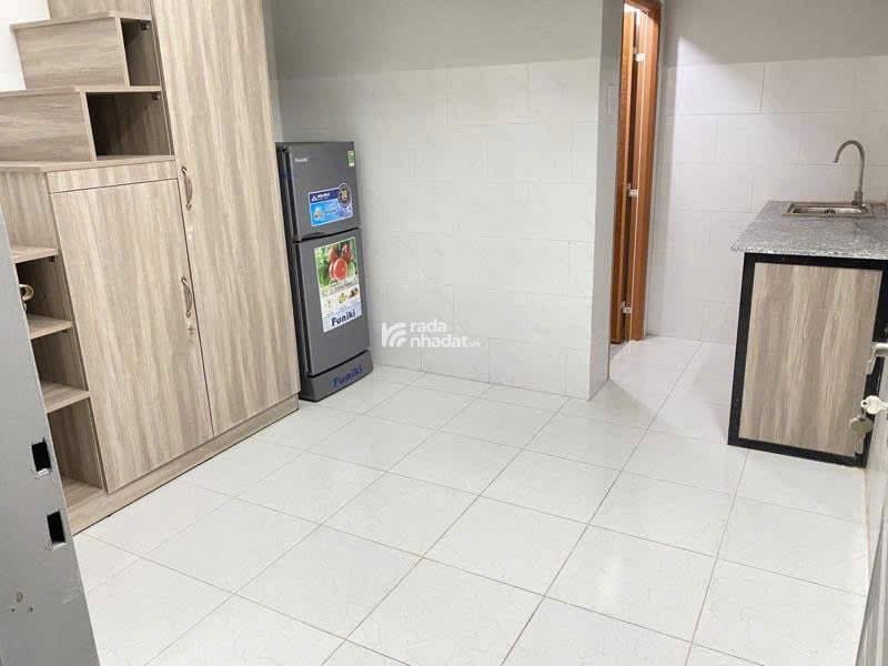 Bán CHDV 5 tầng view chợ Hạnh Thông Tây ngang 5m 75m2 9PN hẻm 8m thông chỉ 10.9 tỷ.