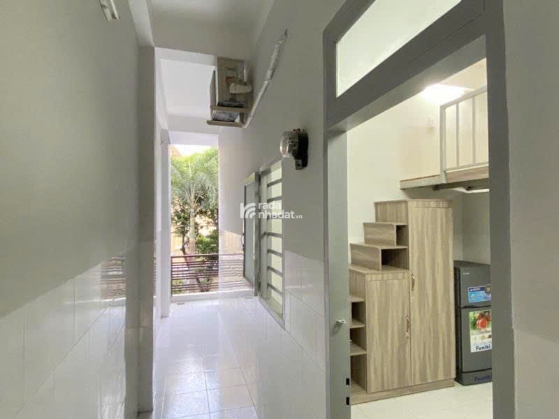 Bán CHDV 5 tầng view chợ Hạnh Thông Tây ngang 5m 75m2 9PN hẻm 8m thông chỉ 10.9 tỷ.