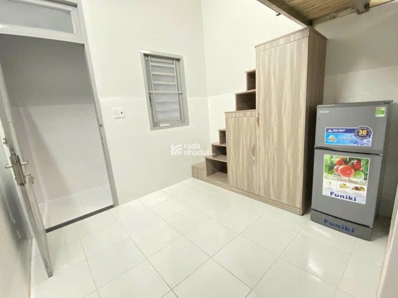 Bán CHDV 5 tầng view chợ Hạnh Thông Tây ngang 5m 75m2 9PN hẻm 8m thông chỉ 10.9 tỷ.