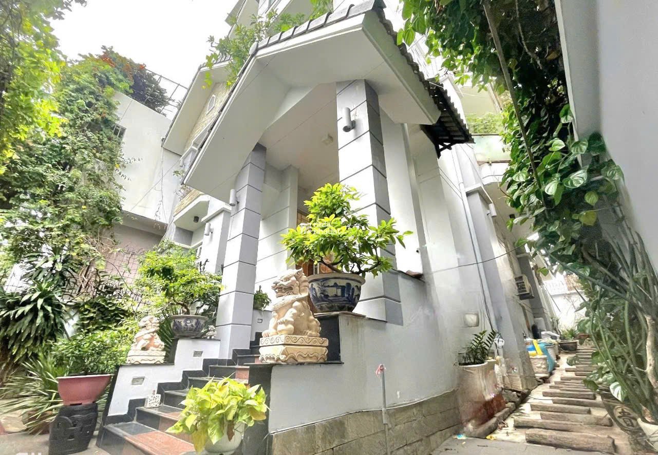 Bán Biệt thự 3 lầu mái Thái ngang 11m 275m2 có hầm T.máy Dương Quảng Hàm tặng NT 46.8 tỷ. 