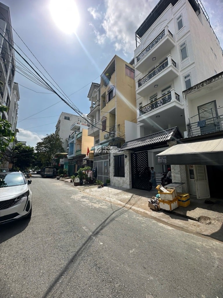 TÒA NHÀ MẶT TIỀN ĐƯỜNG SỐ -TÂN QUY - Q.7 - 7 TẦNG - THANG MÁY-DT: 6.5*18M- 30 TỶ