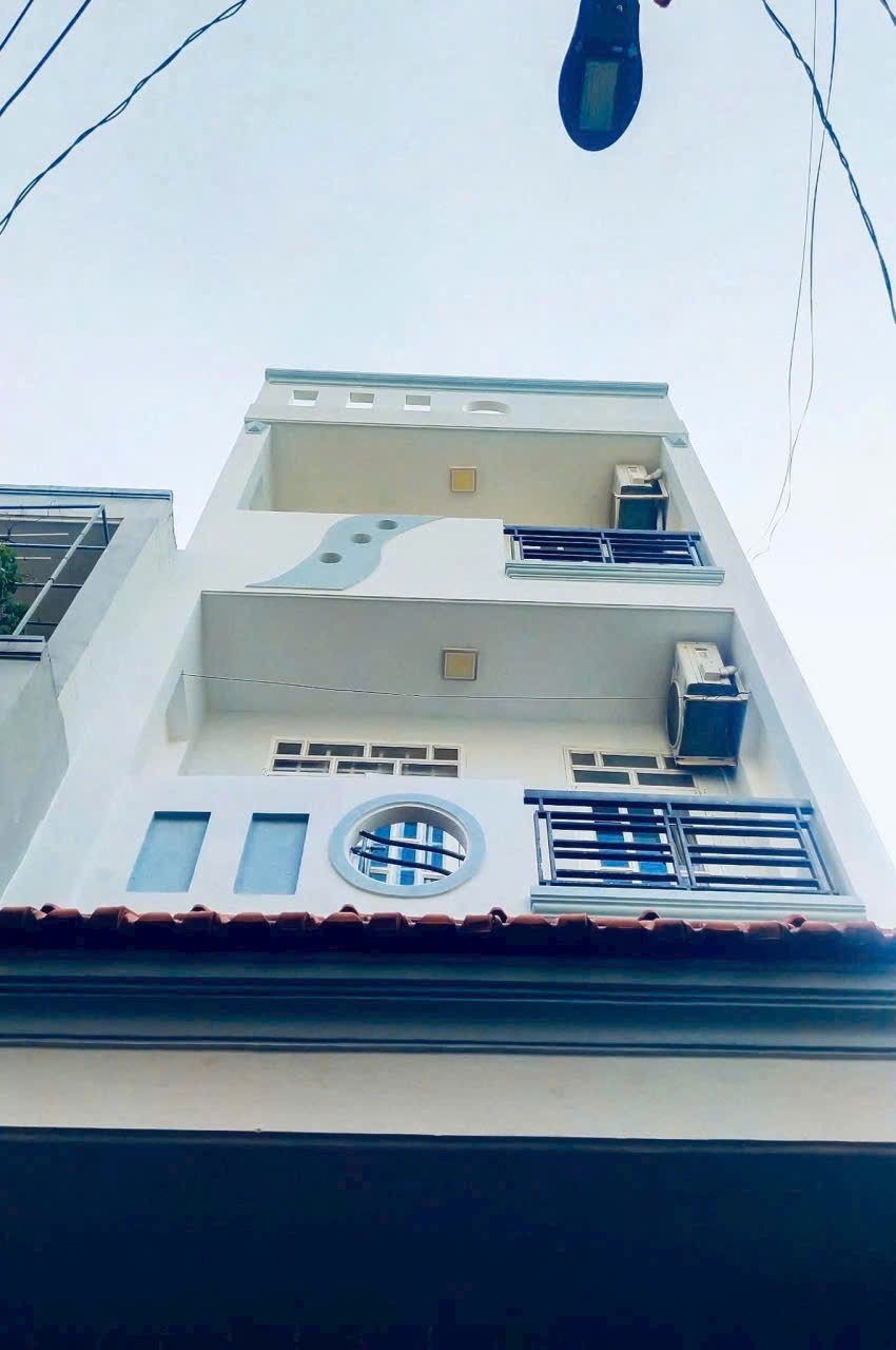 Bán gấp 5 tỷ 350 nhà 50m2 đường Nơ Trang Long Phường 12 Bình Thạnh. Xây 4 tầng, hẻm 4,5m