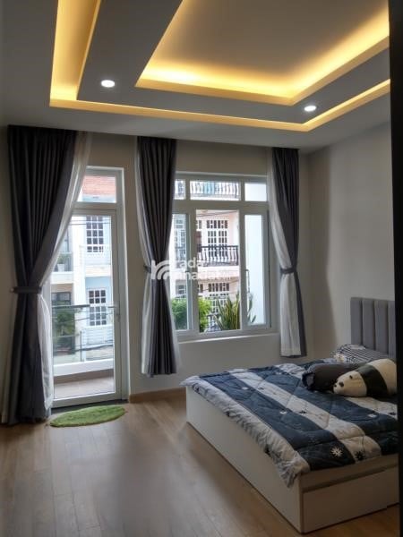 Nhỉnh 9 tỷ có nhà đẹp 5 lầu mới 100% Quang Trung 63m2 ngang 4.2m ngay Mercedes tặng NT 