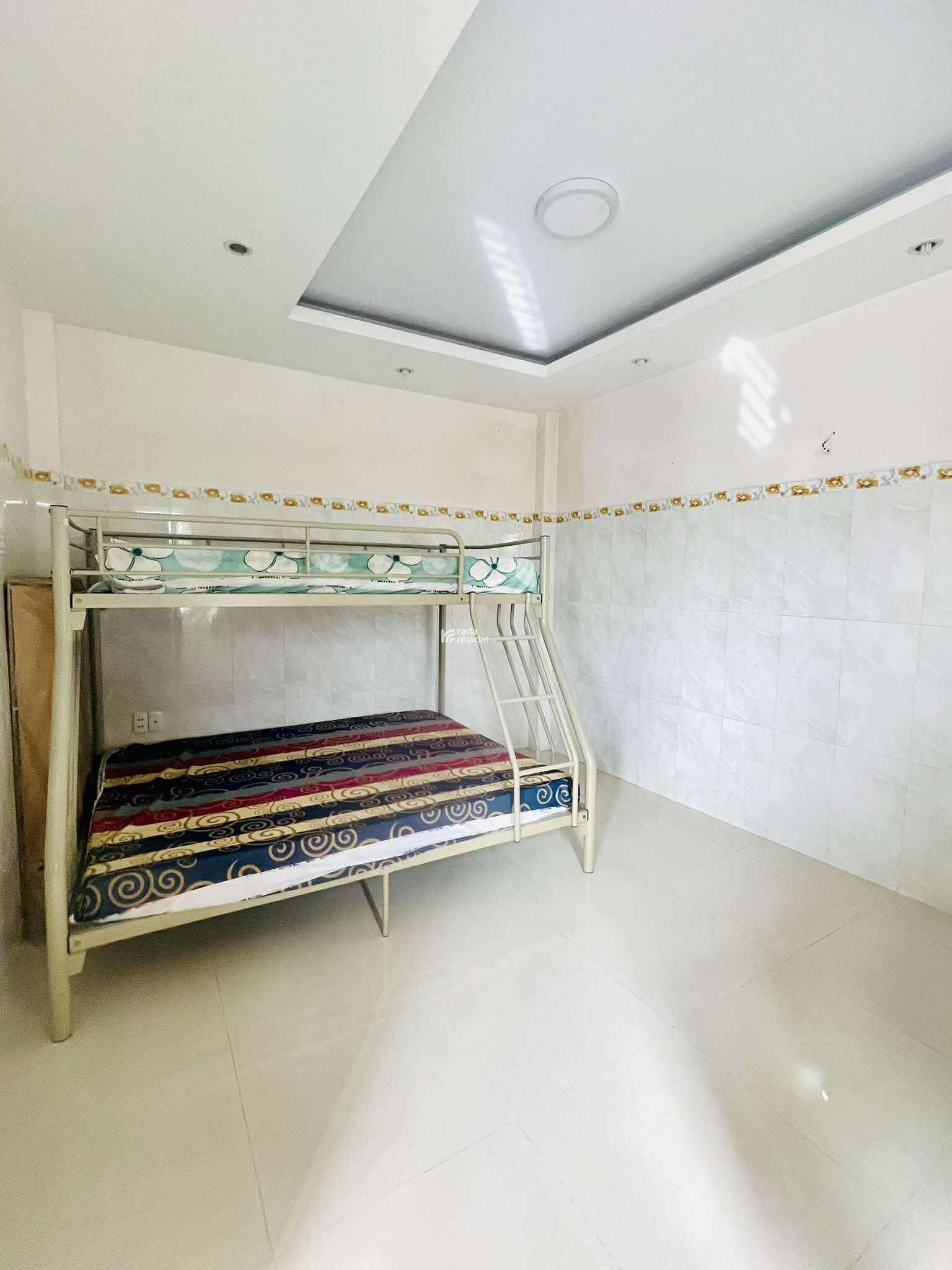 NHÀ HXH THÍCH QUẢNG ĐỨC 5 TẦNG 6 PN - 56m2 (4.6  12) - 10.5 TỶ