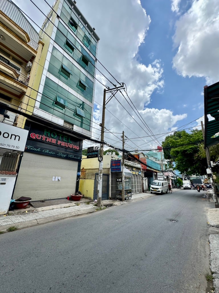 MẶT TIỀN THỐNG NHẤT - TÒA NHÀ 6 TẦNG - 105M2  5.8 X 20 - 15 PHÒNG - DÒNG TIỀN 35TR 