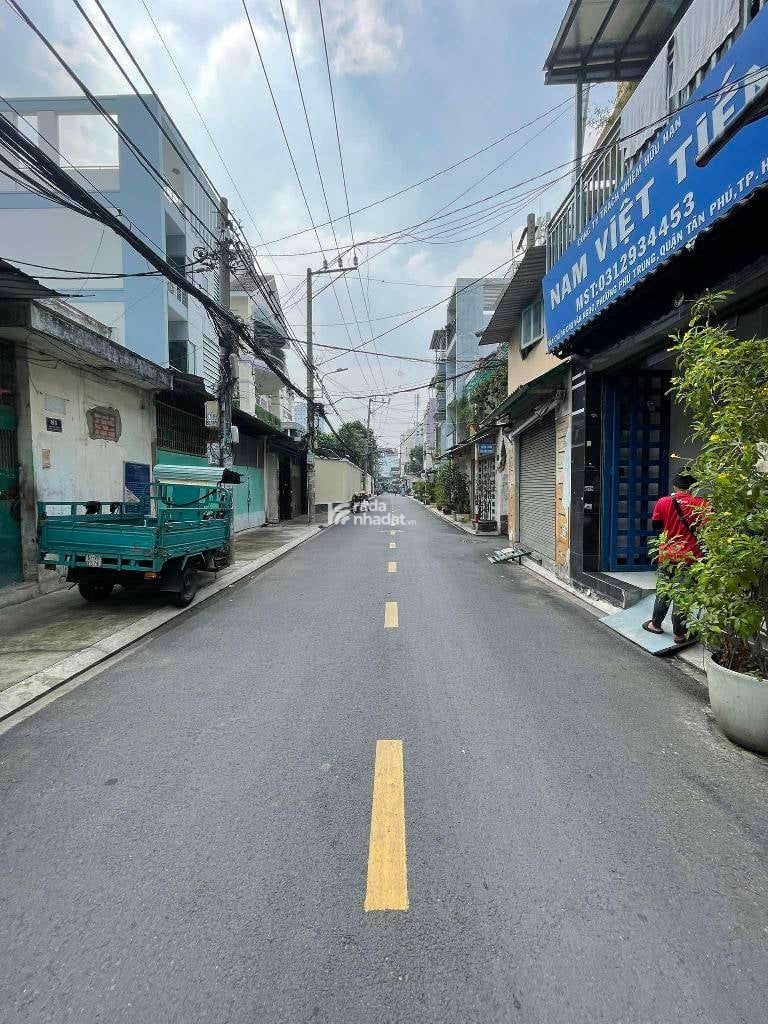 MẶT TIỀN KINH DOANH - TÂN PHÚ - SỔ A4 - 160M - NGANG 5.1M - LỀ ĐƯỜNG 2M -  Ô TÔ NGỦ TRONG NHÀ 