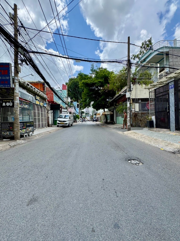 MẶT TIỀN THỐNG NHẤT - TÒA NHÀ 6 TẦNG - 105M2  5.8 X 20 - 15 PHÒNG - DÒNG TIỀN 35TR 