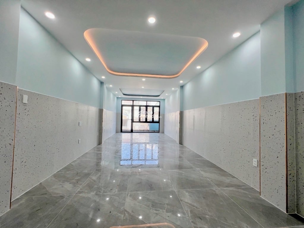 TOÀ VĂN PHÒNG KINH DOANH QUÁCH VŨ - 6TẦNG  THANG MÁY - ĐƯỜNG NHỰA 10M CÓ VỈA HÈ - 15.xTy