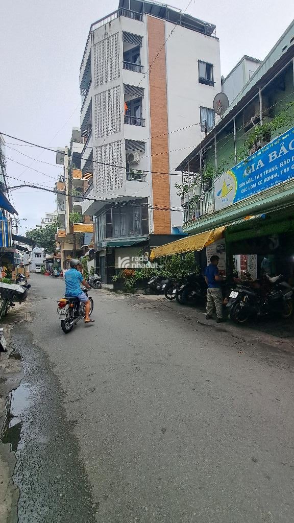 NHÀ GÓC 2 MẶT TIỀN KINH DOANH - NGANG KHỦNG 11.5M - GIÁP QUẬN 10 - THÔNG XE TẢI - ĐANG CHO THUÊ