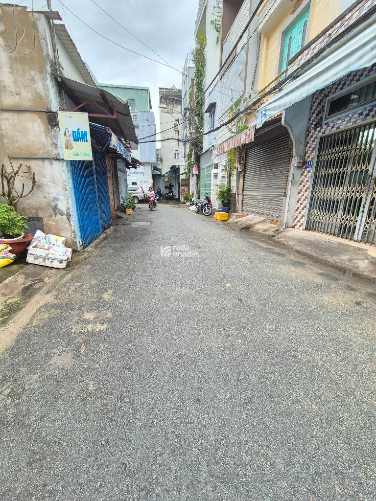 MẶT TIỀN TÂY SƠN - CÓ HẺM SAU - 51M2 - 2 TẦNG - XE HƠI NGỦ TRONG NHÀ 
